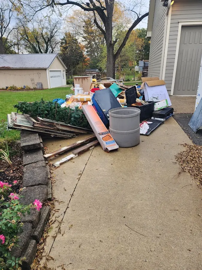 Dumpster being loaded with debris for 3 Yard Dumpster Rental in Sloatsburg